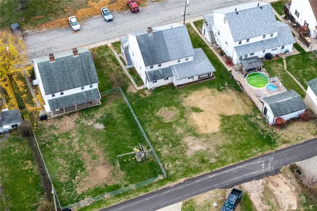 a view of swimming pool from a balcony