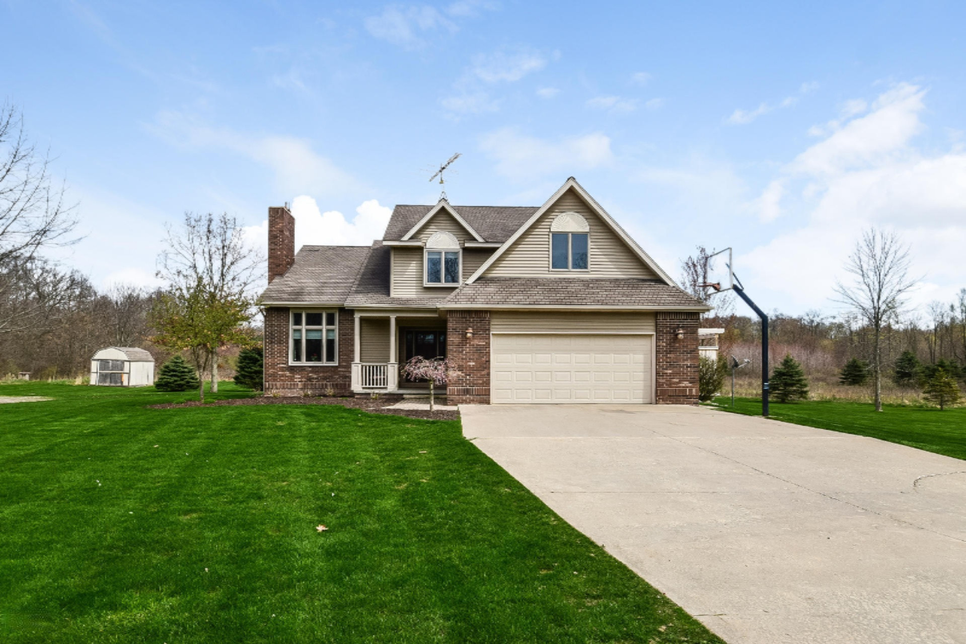 4950 Zahm Road Belding, MI 48809 - Photo 1 of 62 001-Front_View-4006053-medium