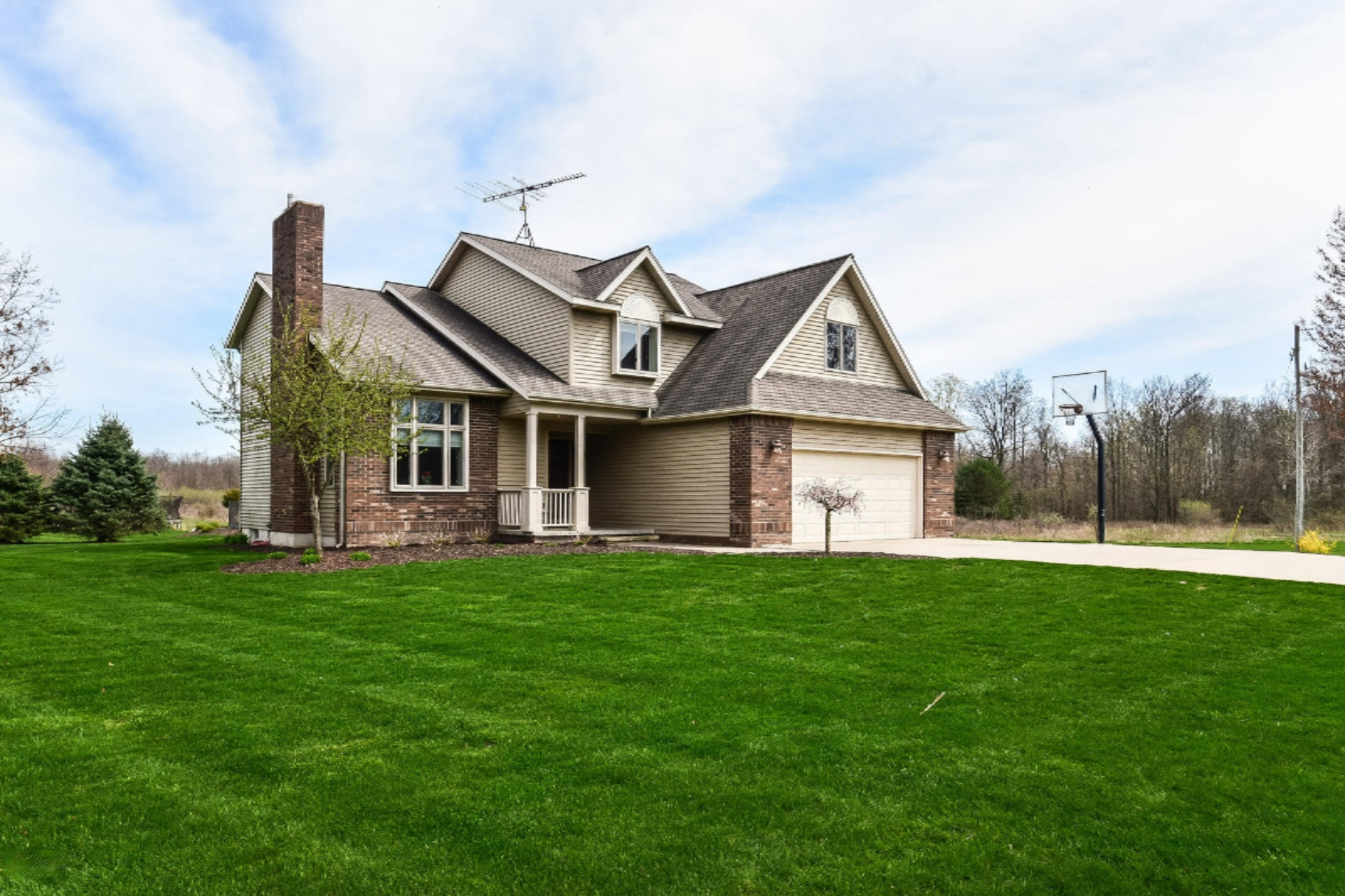 4950 Zahm Road Belding, MI 48809 - Photo 4 of 62 004-Front_View-4006055-medium