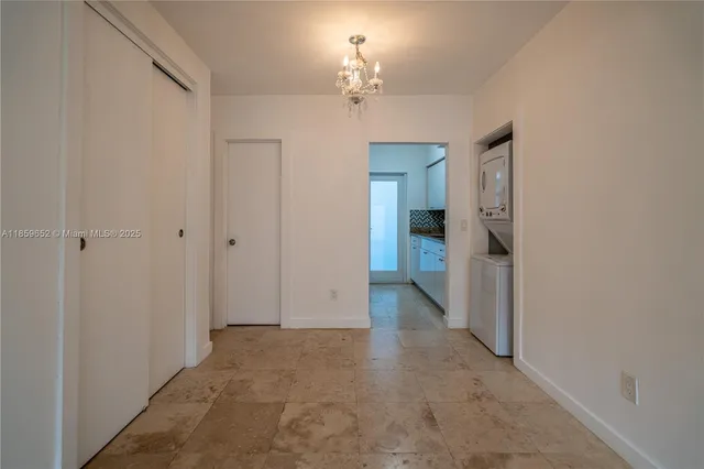 a view of a chandelier and entryway