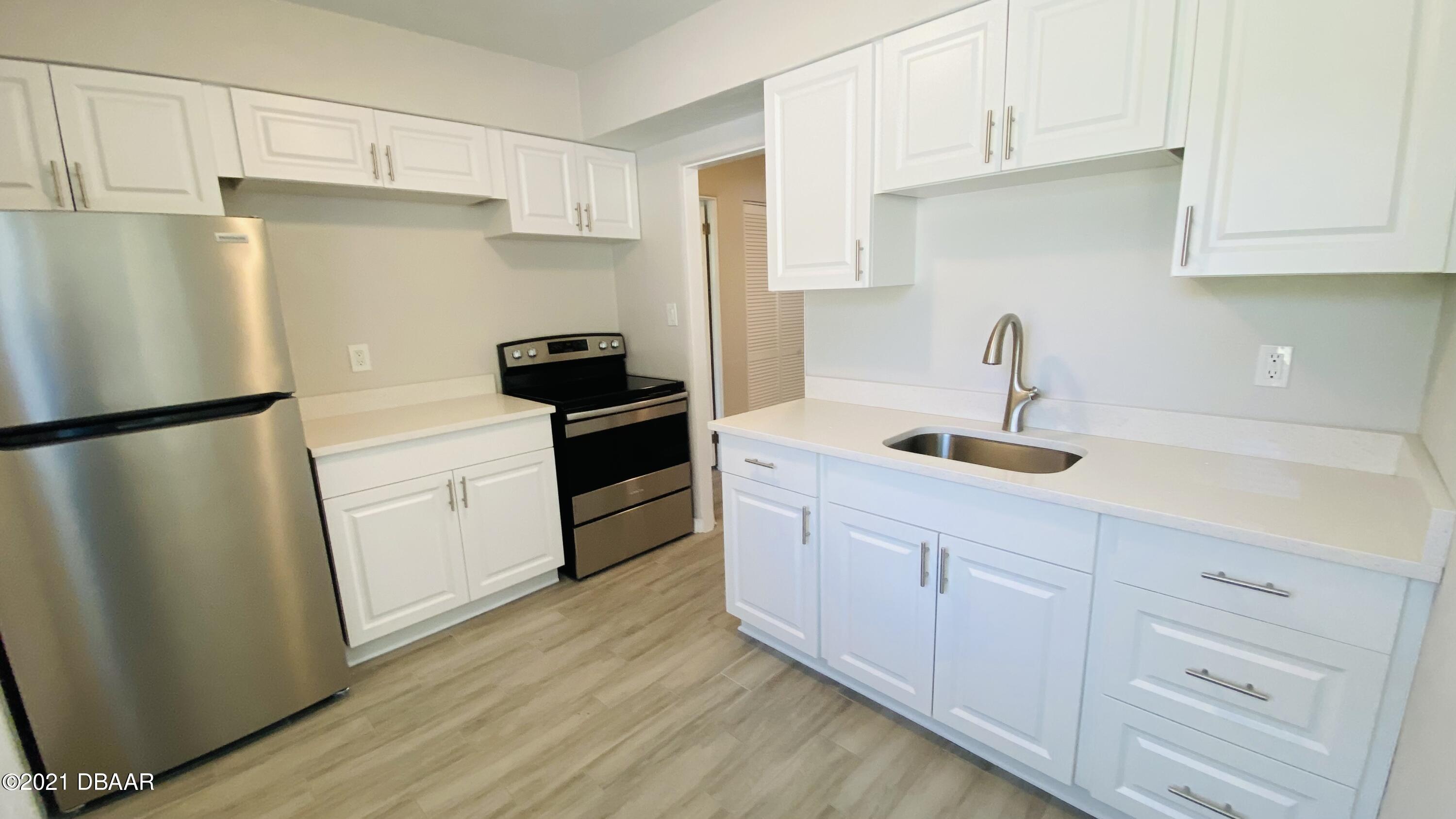 914 North Wild Olive Avenue, Unit 912 Daytona Beach, FL 32118 - Photo 13 of 38 3F1F2D7F-1FF6-434E-9901-2EADA964E46E