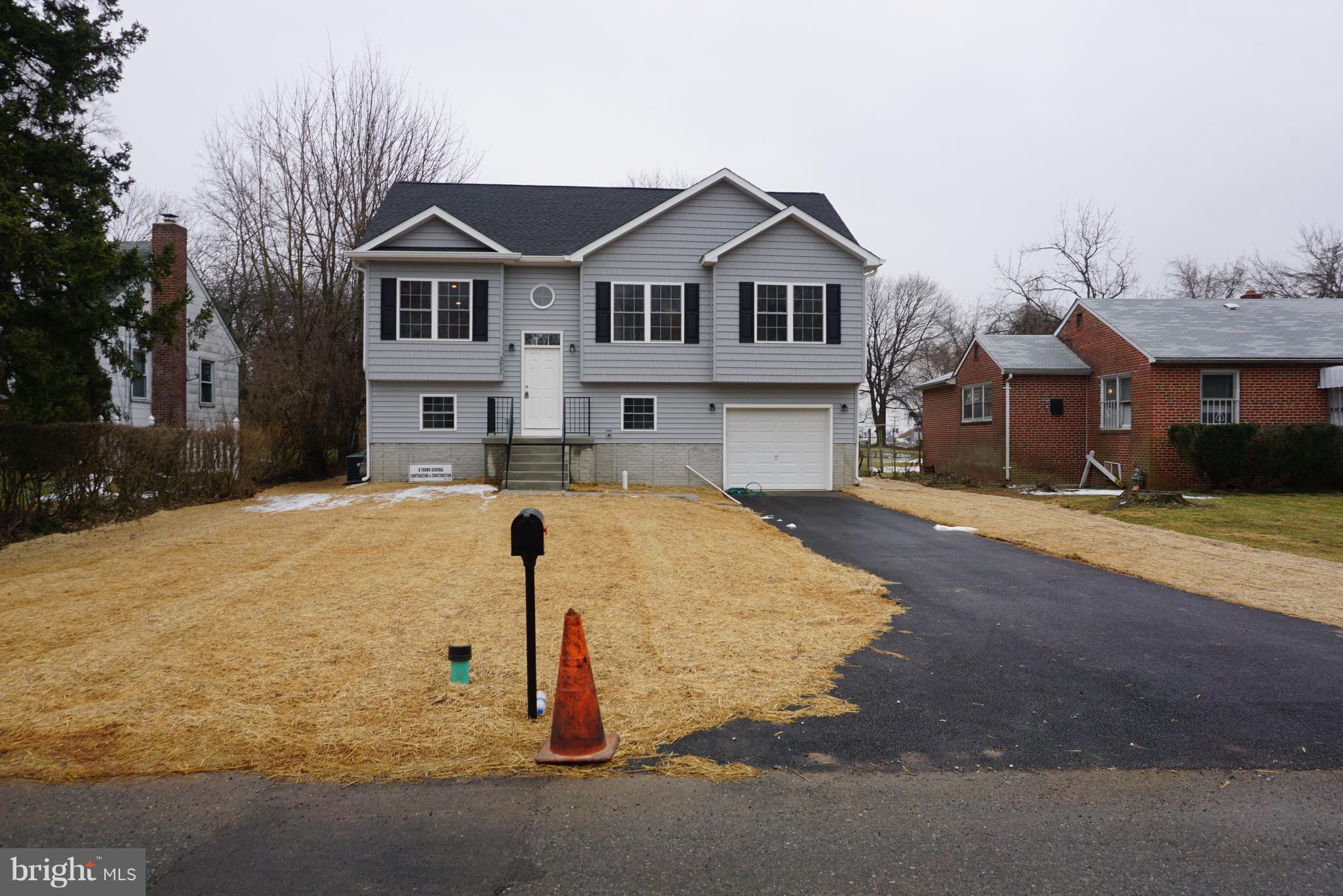 3611 Florida Road Baltimore, MD 21244 - Photo 1 of 30 a front view of a house with a yard