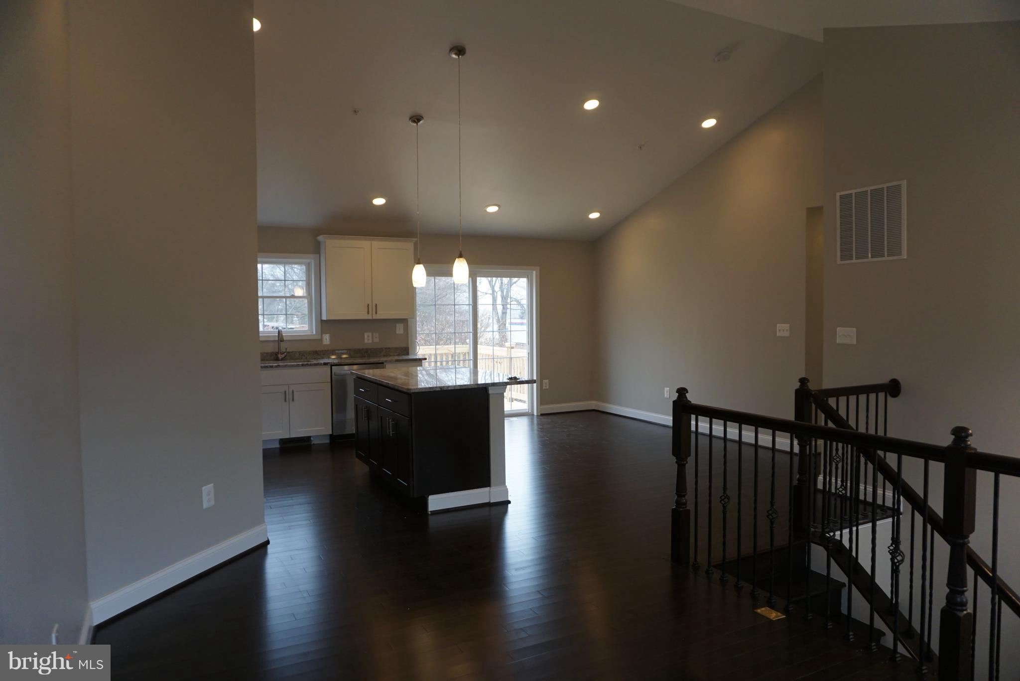 3611 Florida Road Baltimore, MD 21244 - Photo 4 of 30 a view of kitchen with cabinets and wooden floor