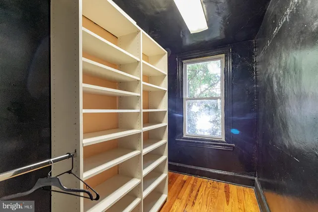 a view of a balcony with wooden floor