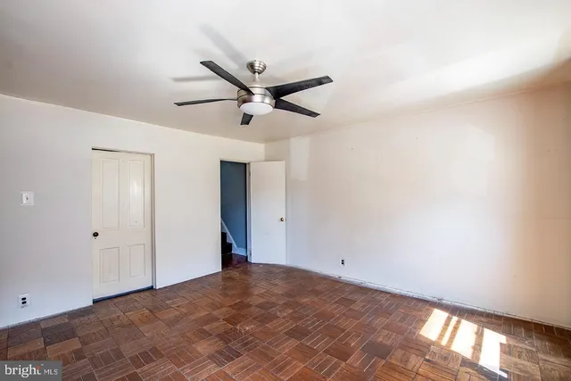 a view of a big room with carpet