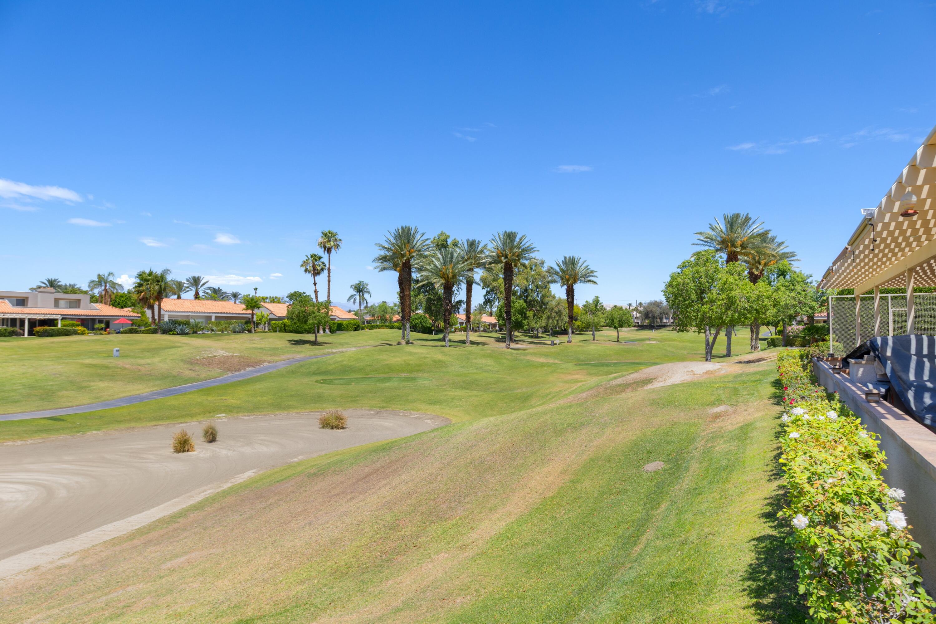 39 Augusta Drive Rancho Mirage, CA 92270 - Photo 47 of 53 a view of an outdoor space and a yard