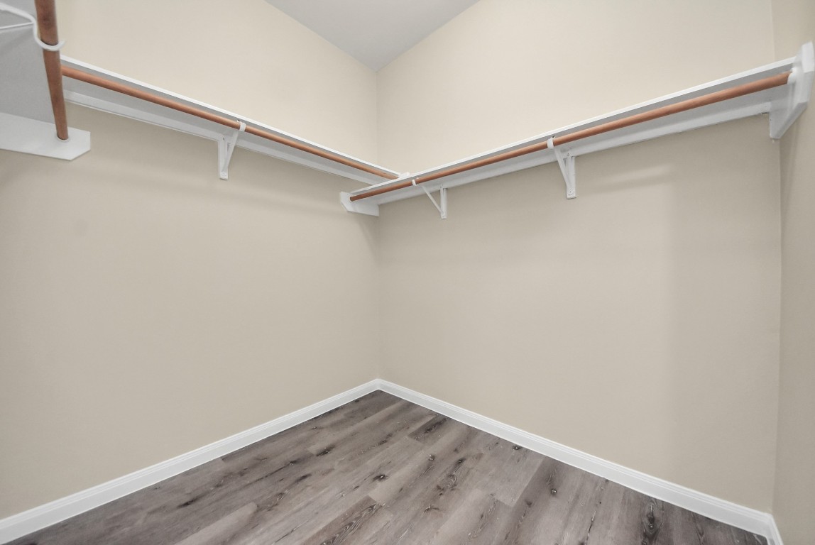 1855 Garnet Breeze Drive Rosharon, TX 77583 - Photo 16 of 38 a view of an empty walk in closet