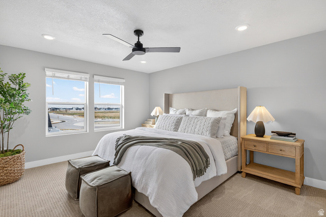 2841 West 2705 North, Unit 69 Ogden, UT 84404 - Photo 12 of 31 Light gray walls complement the neutral carpeted flooring