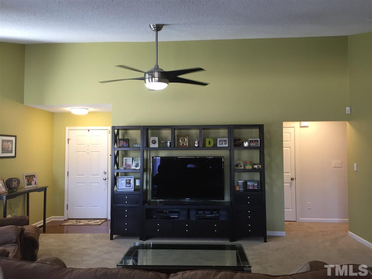 3613 Deering Drive Raleigh, NC 27616 - Photo 5 of 20 a living room with furniture and a flat screen tv