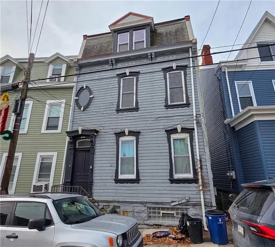 a car parked in front of a building