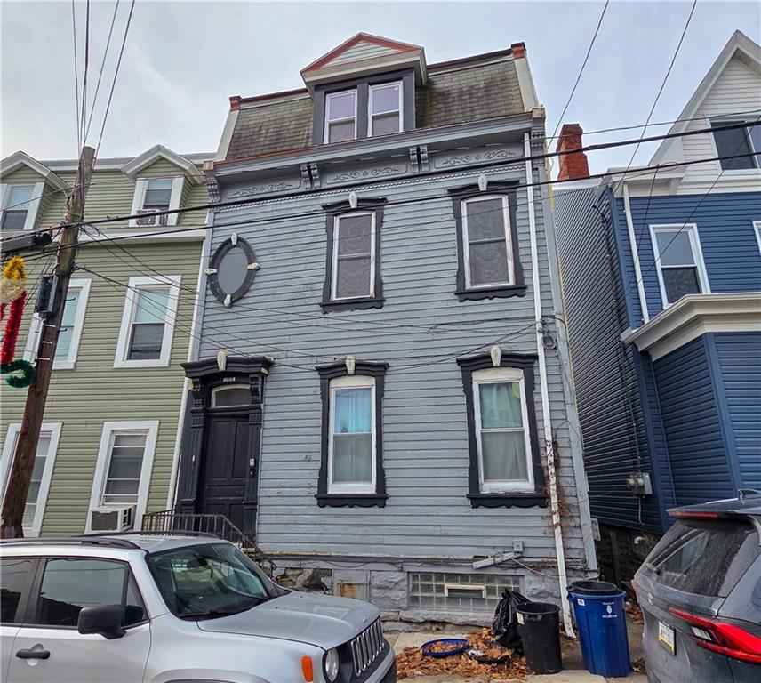 a car parked in front of a building