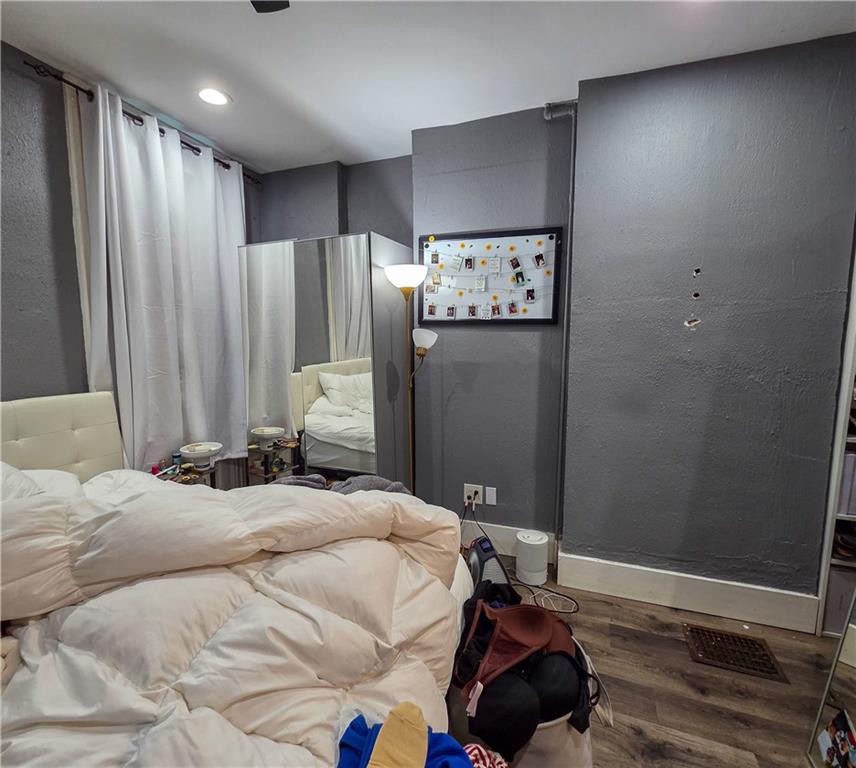 1809 Rialto Street Pittsburgh, PA 15212 - Photo 23 of 36 a bedroom with a bed and a window