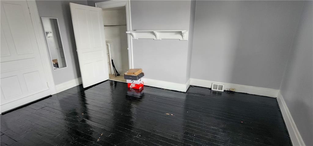 1809 Rialto Street Pittsburgh, PA 15212 - Photo 34 of 36 a view of empty room with wooden floor