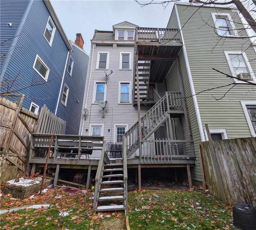1809 Rialto Street Pittsburgh, PA 15212 - Photo 4 of 36 a view of front of house with a small yard