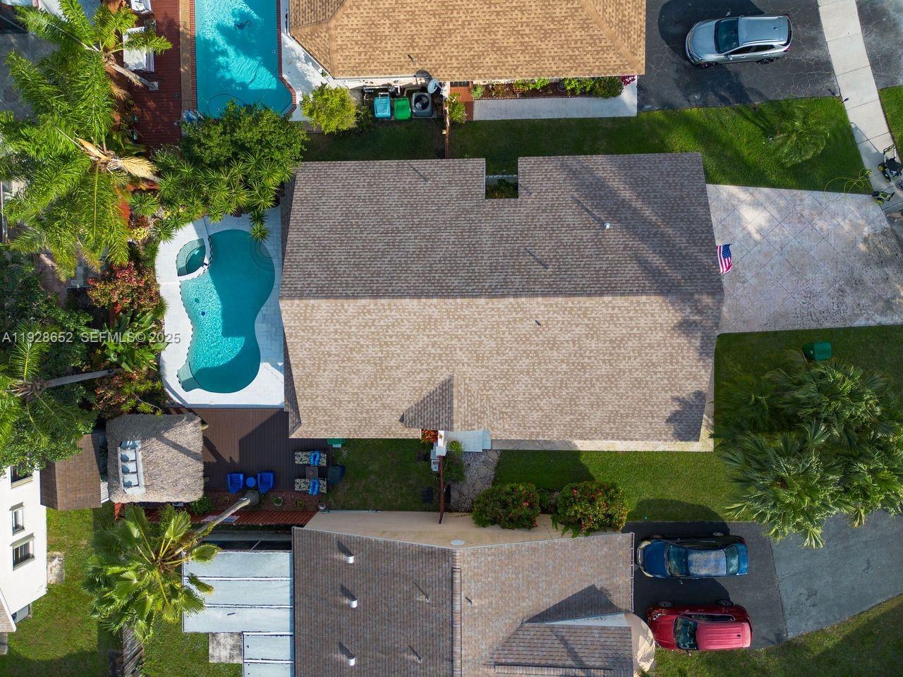 9871 Southwest 58th Court Cooper City, FL 33328 - Photo 44 of 54 an aerial view of a house with a yard