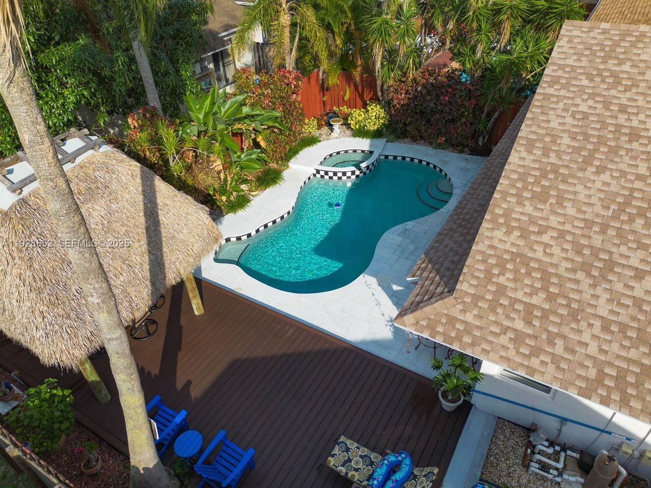 9871 Southwest 58th Court Cooper City, FL 33328 - Photo 46 of 54 an aerial view of a house