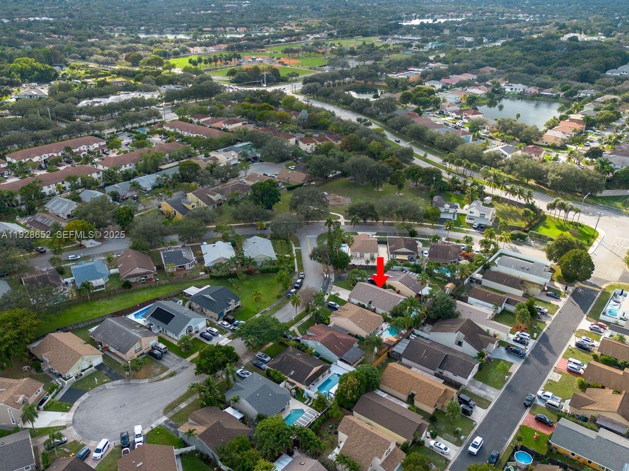 9871 Southwest 58th Court Cooper City, FL 33328 - Photo 49 of 54 an aerial view of residential houses with outdoor space and street view