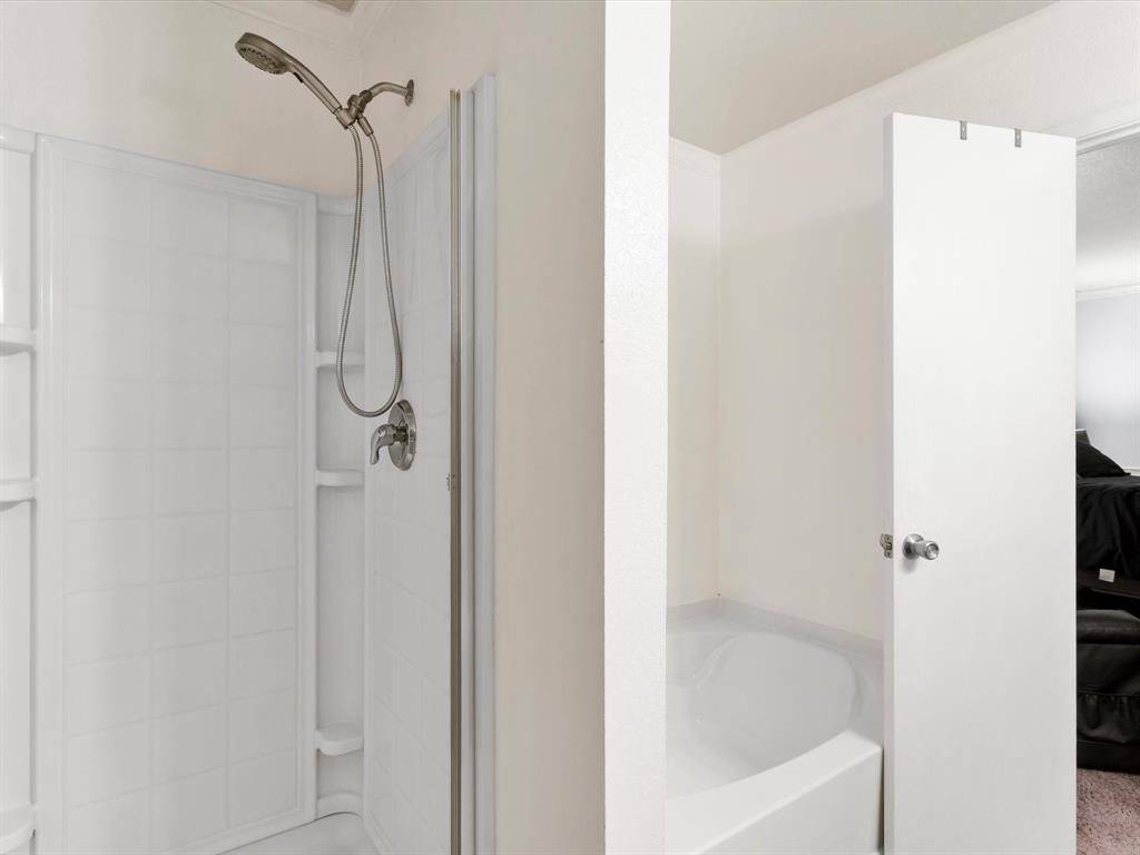 1129 Switchgrass Lane Crowley, TX 76036 - Photo 23 of 40 a bathroom with a shower