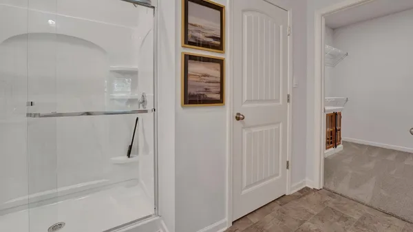 a bathroom with a granite countertop sink mirror and a