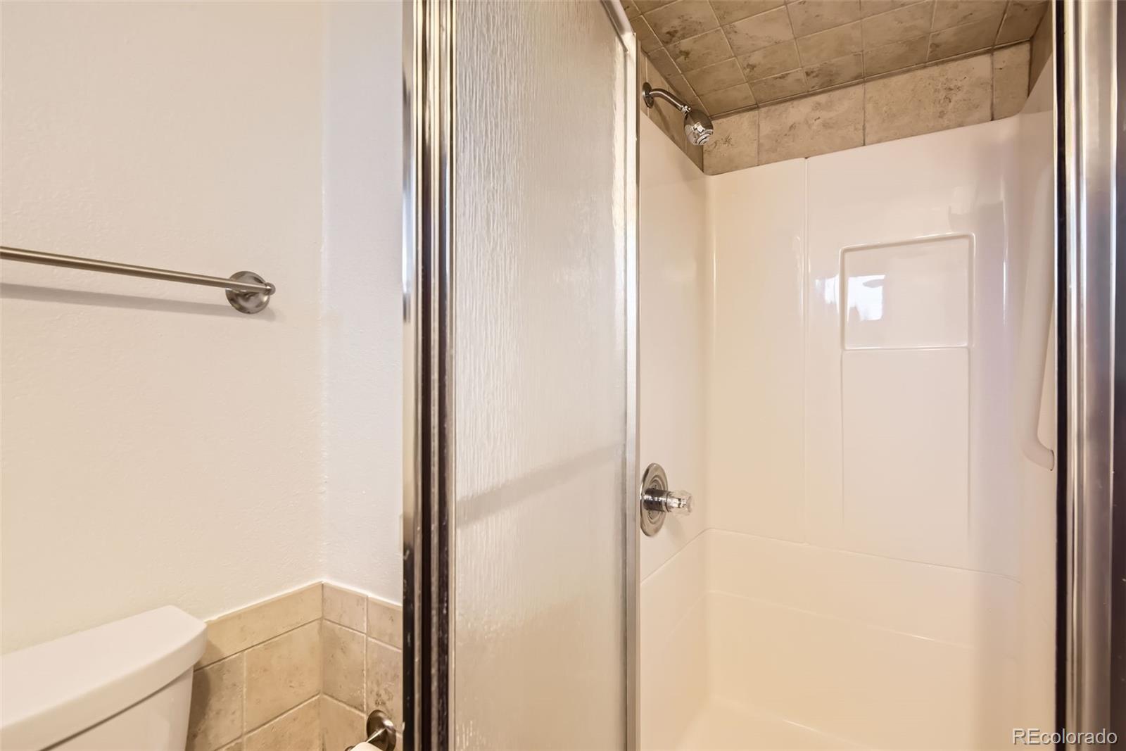 367 Jupiter Drive Lone Tree, CO 80124 - Photo 11 of 15 a bathroom with a shower
