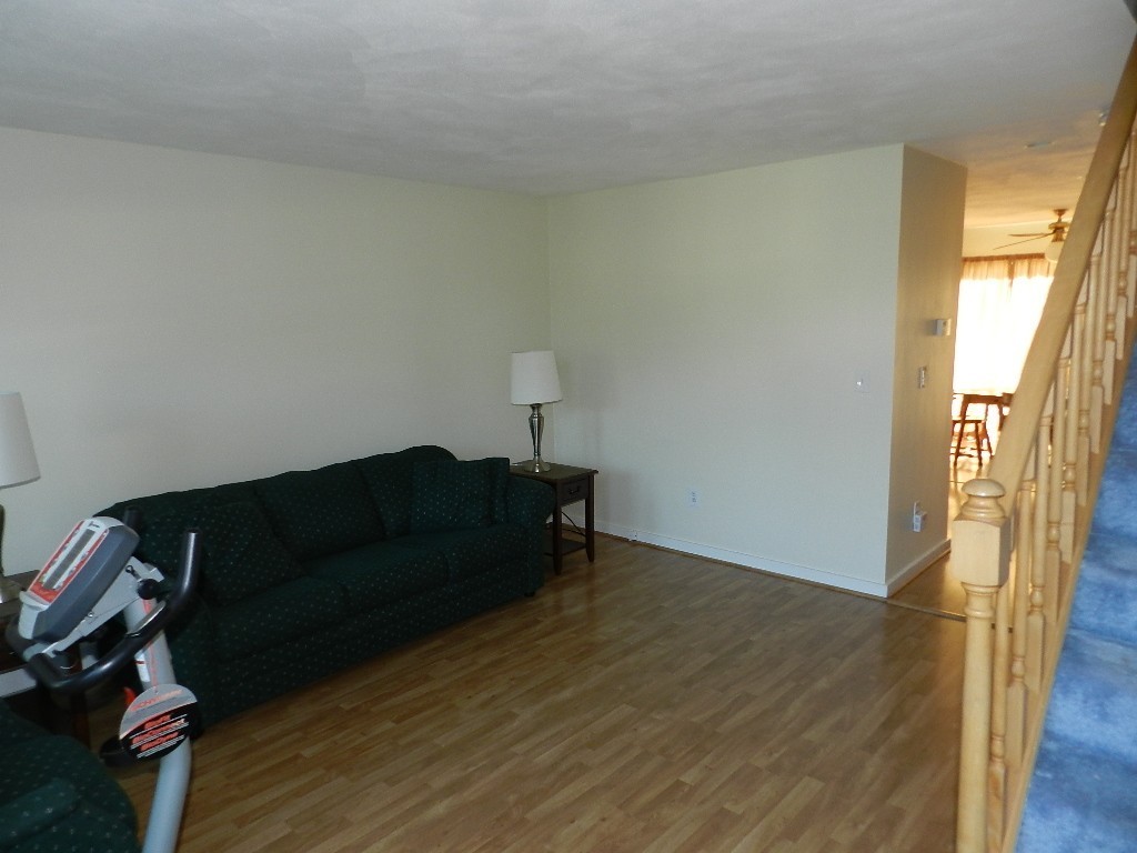 40 Wrentham Road, Unit 40 Worcester, MA 01602 - Photo 6 of 11 a living room with furniture and a window