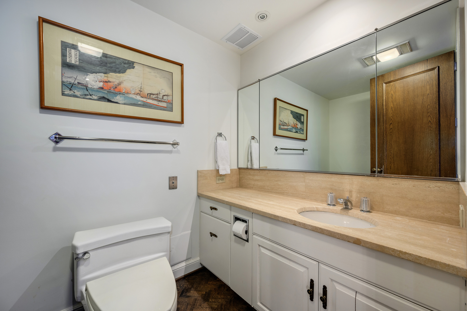 180 East Pearson Street, Unit 6802 Chicago, IL 60611 - Photo 14 of 33 a bathroom with a granite countertop toilet a sink and mirror