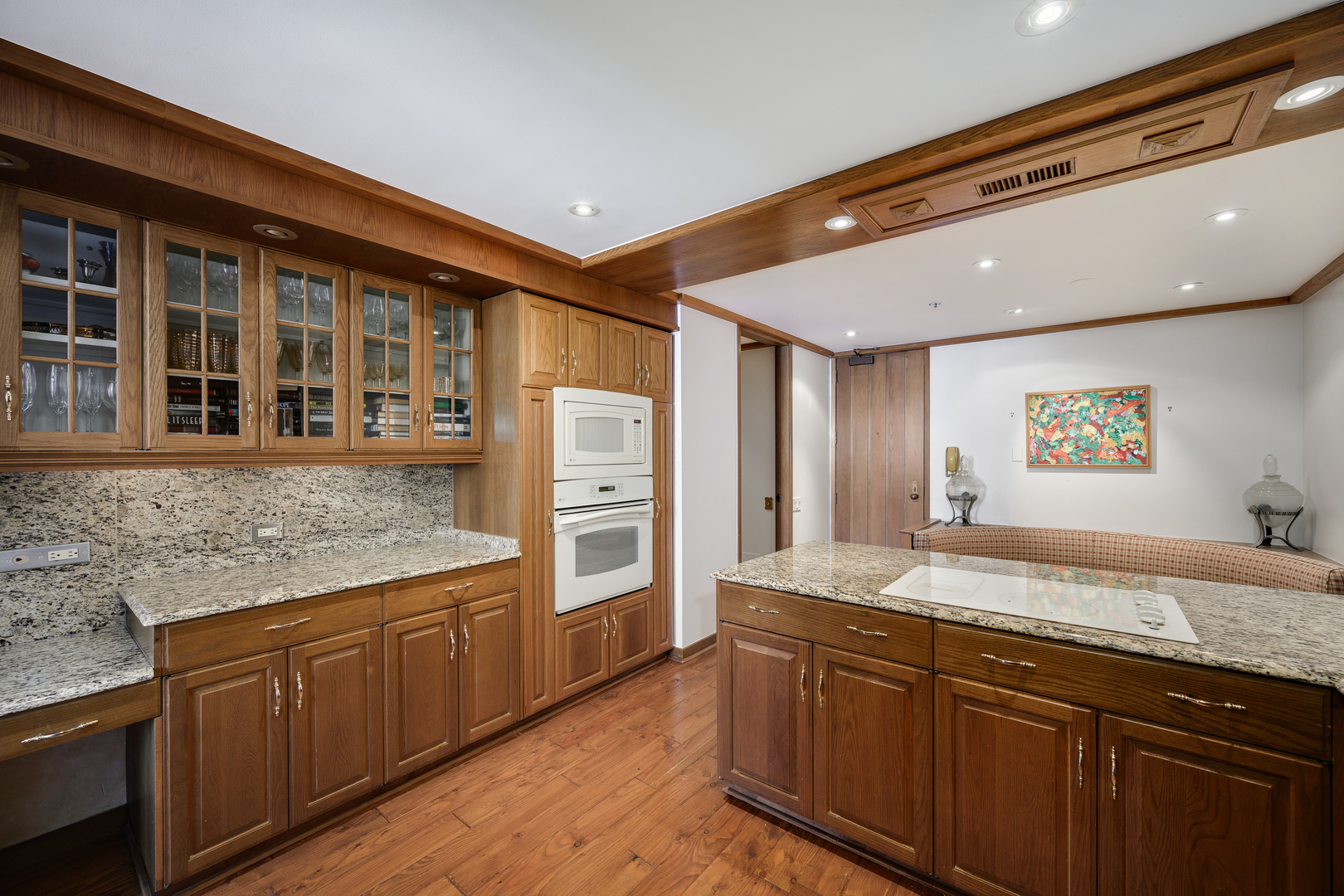 180 East Pearson Street, Unit 6802 Chicago, IL 60611 - Photo 18 of 33 a bathroom with a granite countertop sink and a large mirror