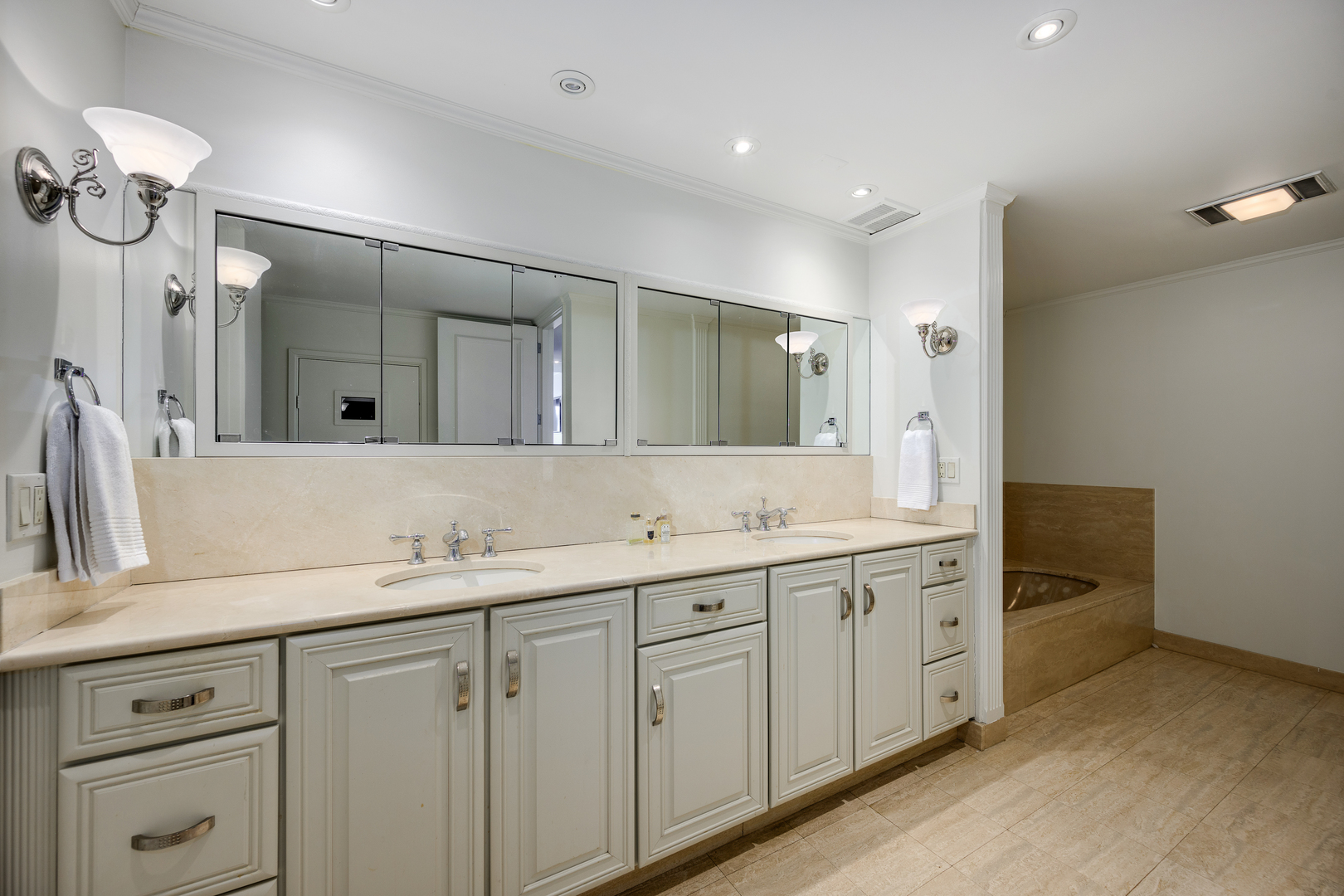 180 East Pearson Street, Unit 6802 Chicago, IL 60611 - Photo 26 of 33 a bathroom with a double vanity sink mirror and