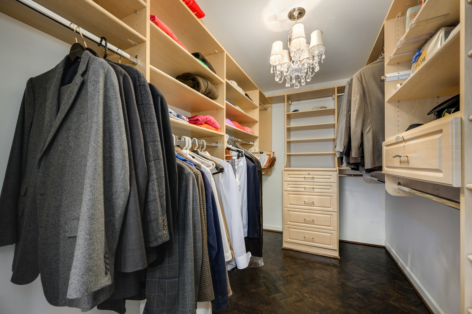 180 East Pearson Street, Unit 6802 Chicago, IL 60611 - Photo 29 of 33 a view of walk in closet with clothes and shoes