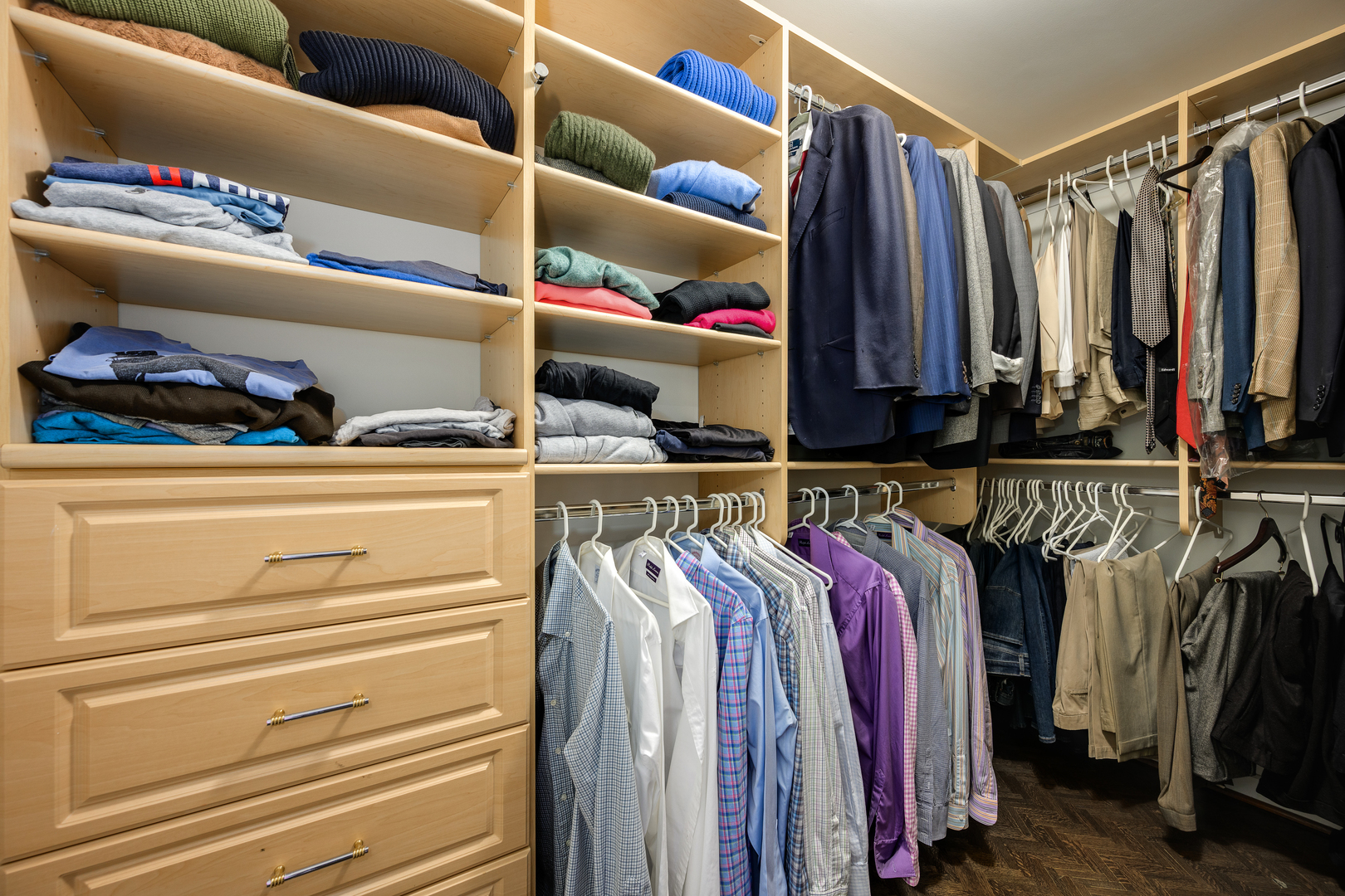 180 East Pearson Street, Unit 6802 Chicago, IL 60611 - Photo 30 of 33 a view of walk in closet with clothes and shoes
