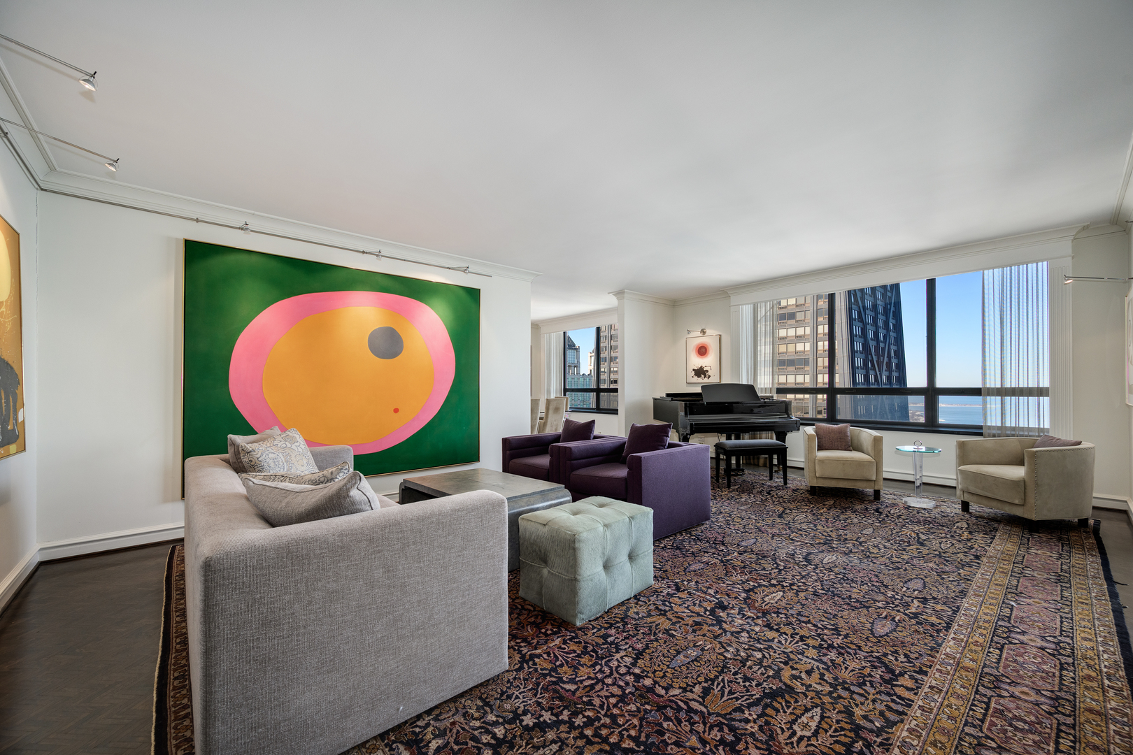 180 East Pearson Street, Unit 6802 Chicago, IL 60611 - Photo 3 of 33 a living room with furniture and a wooden floor