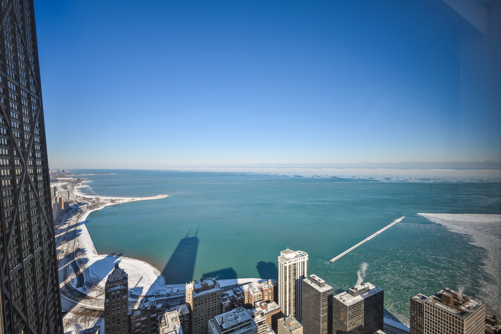 180 East Pearson Street, Unit 6802 Chicago, IL 60611 - Photo 32 of 33 a view of a lake with city from a lake