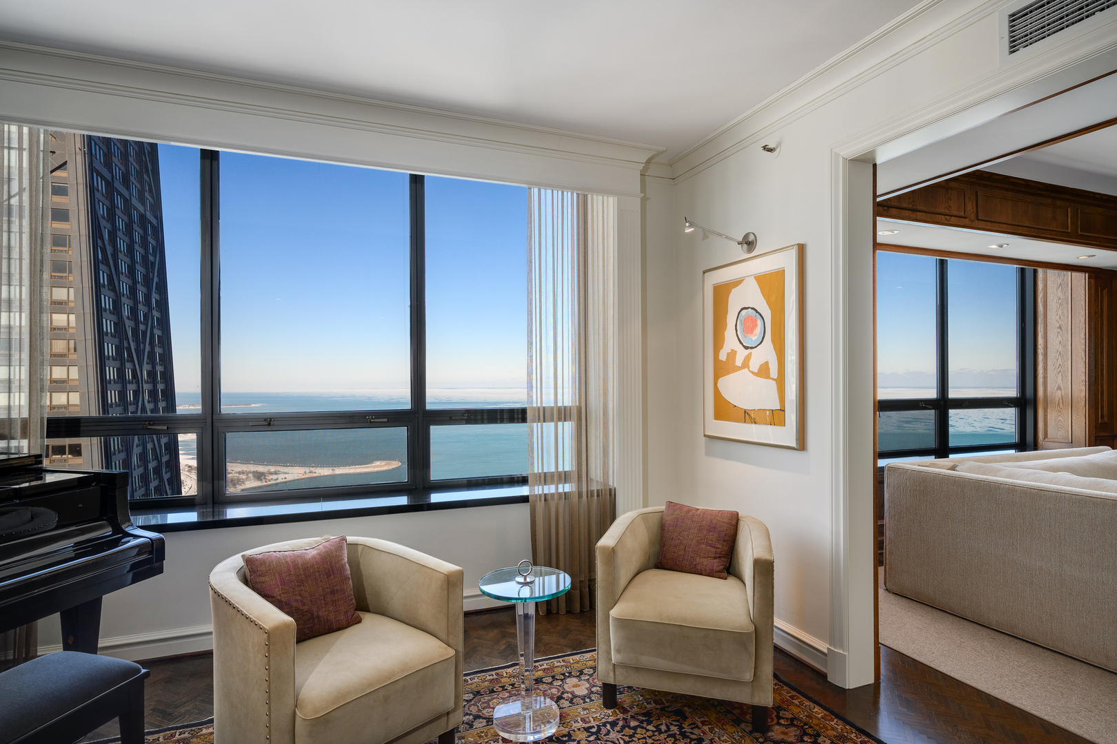 180 East Pearson Street, Unit 6802 Chicago, IL 60611 - Photo 9 of 33 a living room with furniture and a window