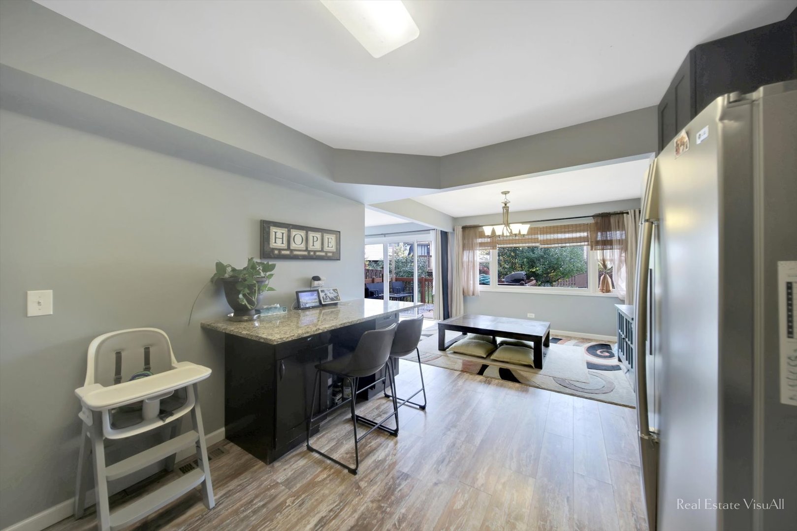 1005 Spring Mill Drive Hoffman Estates, IL 60169 - Photo 15 of 44 a view of a workspace with furniture and a window