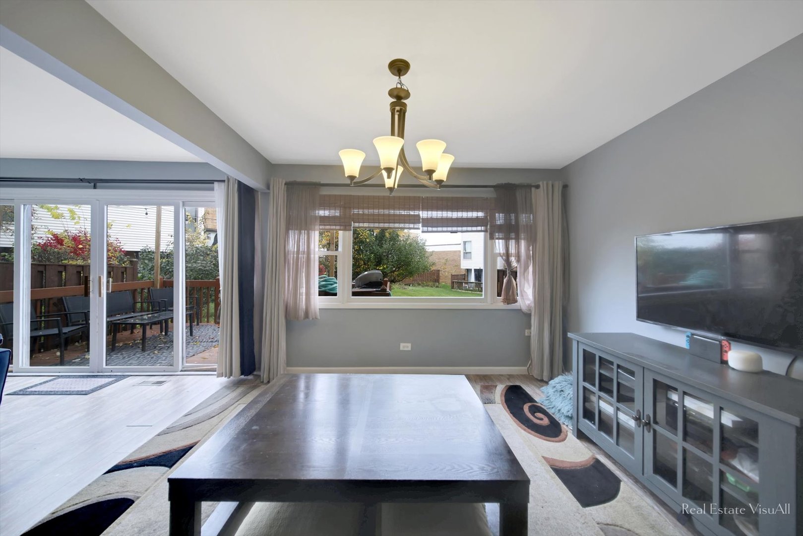1005 Spring Mill Drive Hoffman Estates, IL 60169 - Photo 16 of 44 a view of a dining room with furniture window and outside view