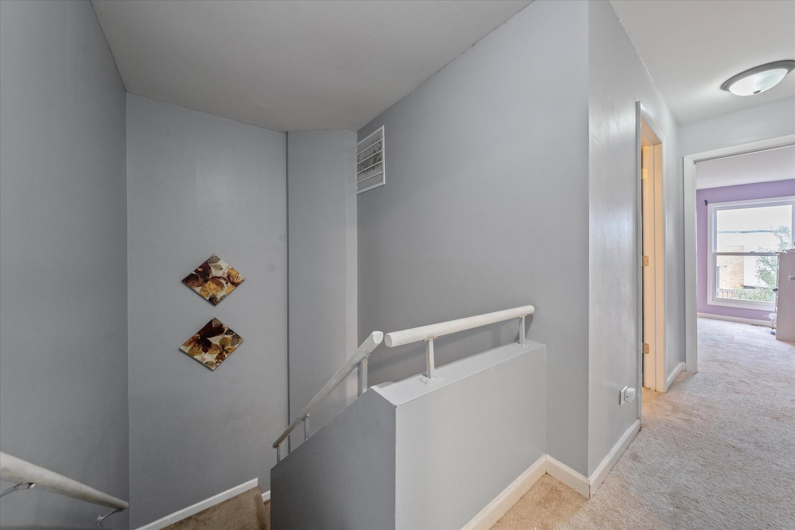 1005 Spring Mill Drive Hoffman Estates, IL 60169 - Photo 19 of 44 a view of hallway with stairs