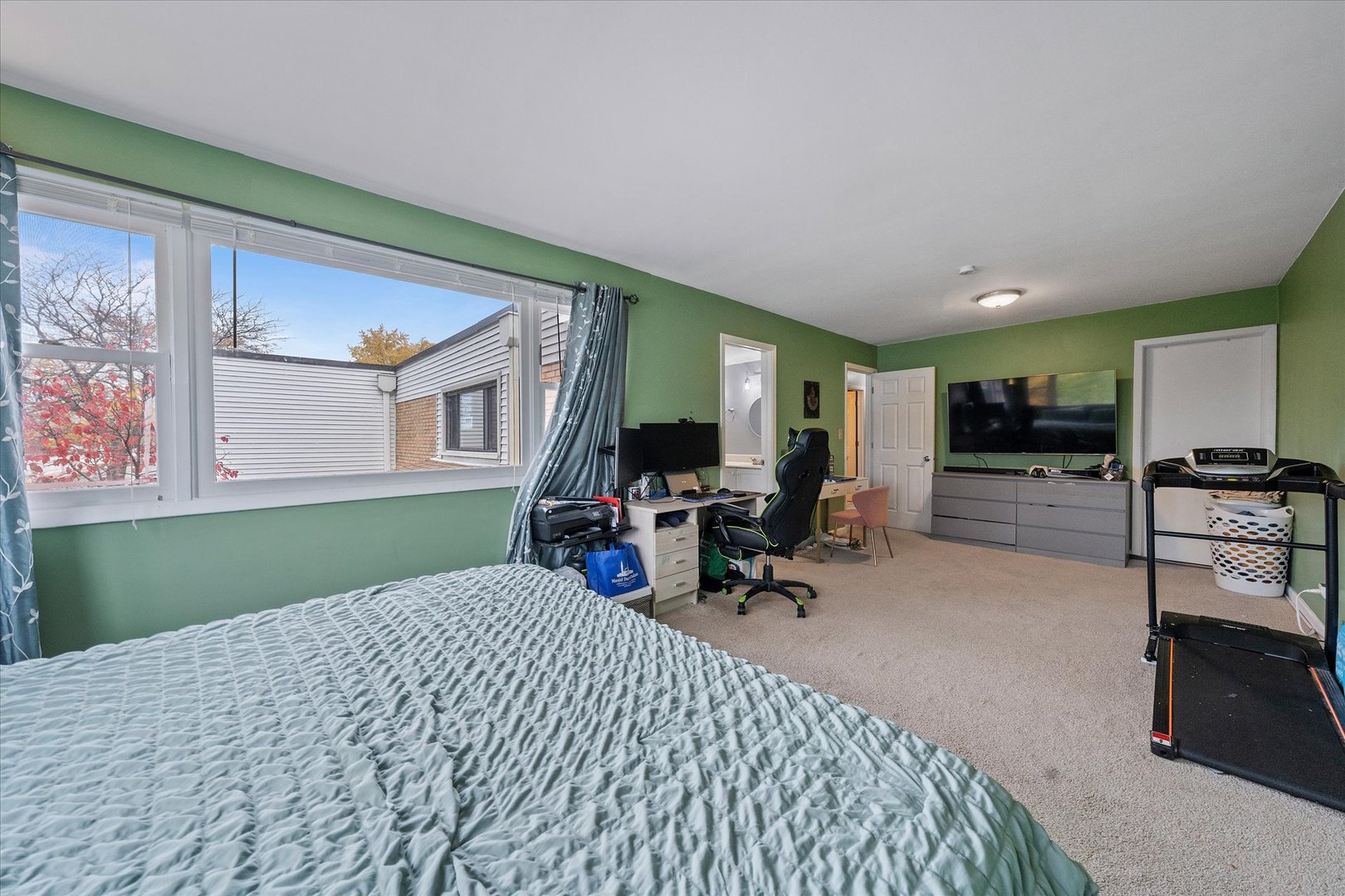 1005 Spring Mill Drive Hoffman Estates, IL 60169 - Photo 24 of 44 a bedroom with furniture and a large window