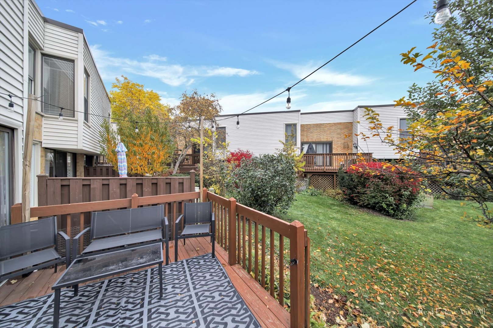 1005 Spring Mill Drive Hoffman Estates, IL 60169 - Photo 35 of 44 a view of a house with backyard and sitting area