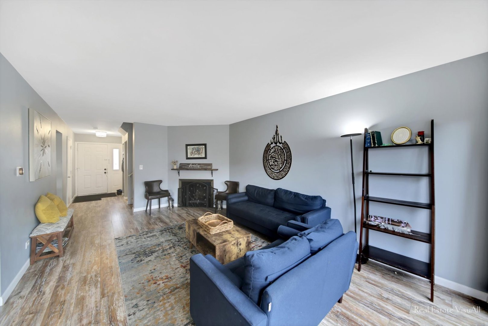 1005 Spring Mill Drive Hoffman Estates, IL 60169 - Photo 6 of 44 a living room with furniture and wooden floor