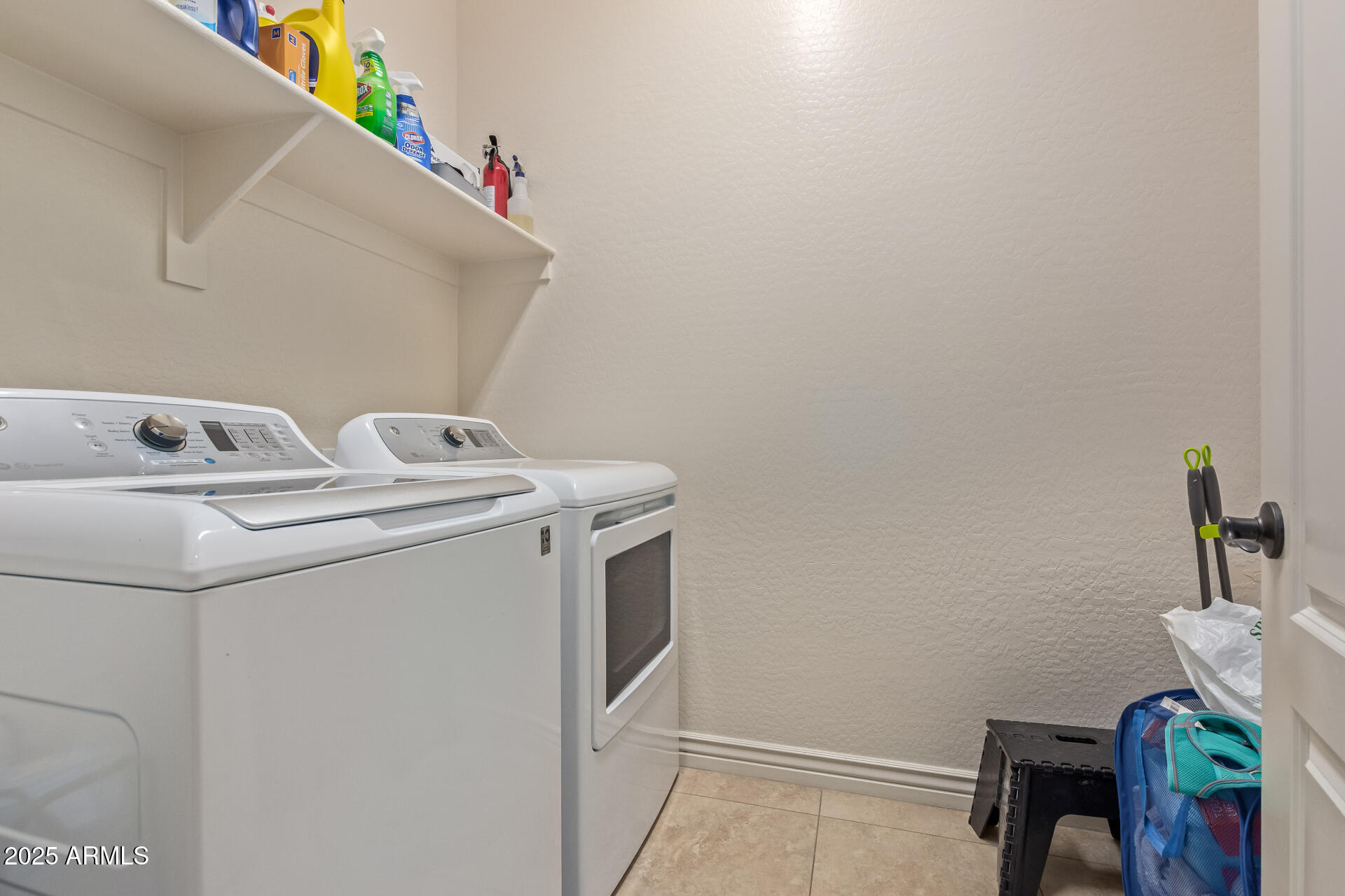 17743 West Verdin Road Goodyear, AZ 85338 - Photo 29 of 69 a utility room with dryer and washer