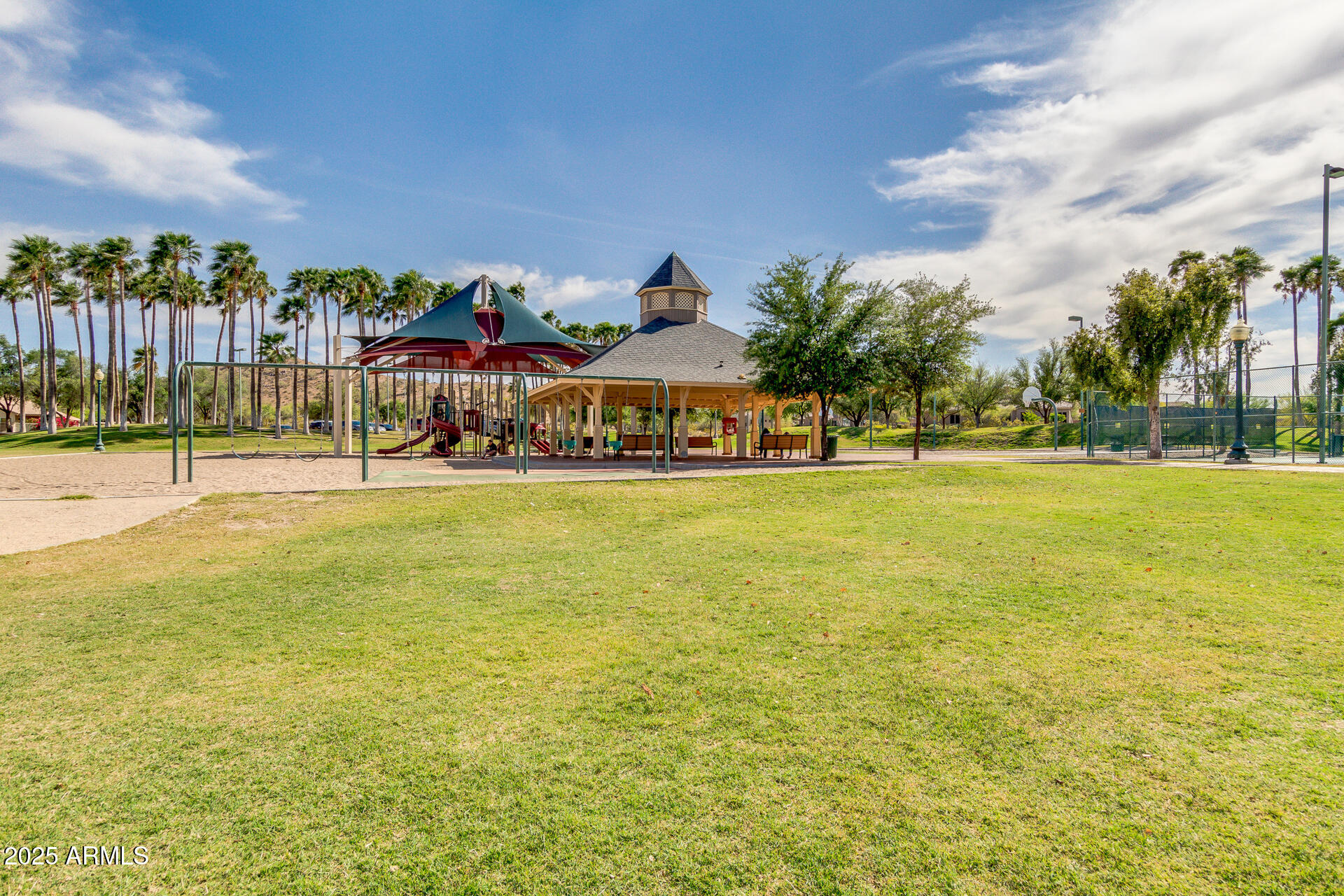 17743 West Verdin Road Goodyear, AZ 85338 - Photo 43 of 69 a view of a swimming pool and an outdoor space