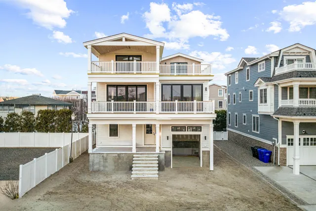 a front view of a building with a lot of windows
