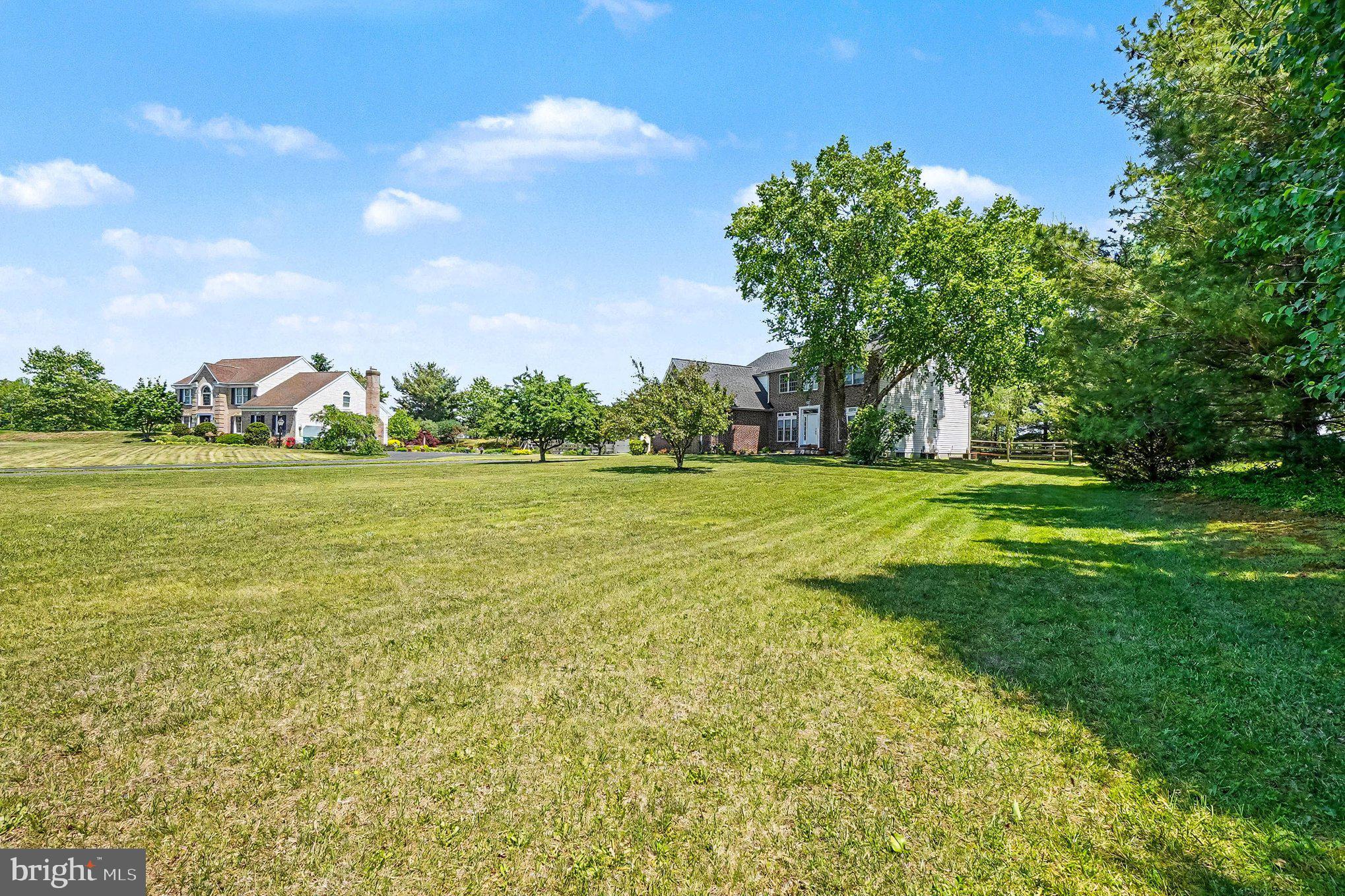 64 Open Meadow Court Elkton, MD 21921 - Photo 5 of 57 a view of a field with grass and trees