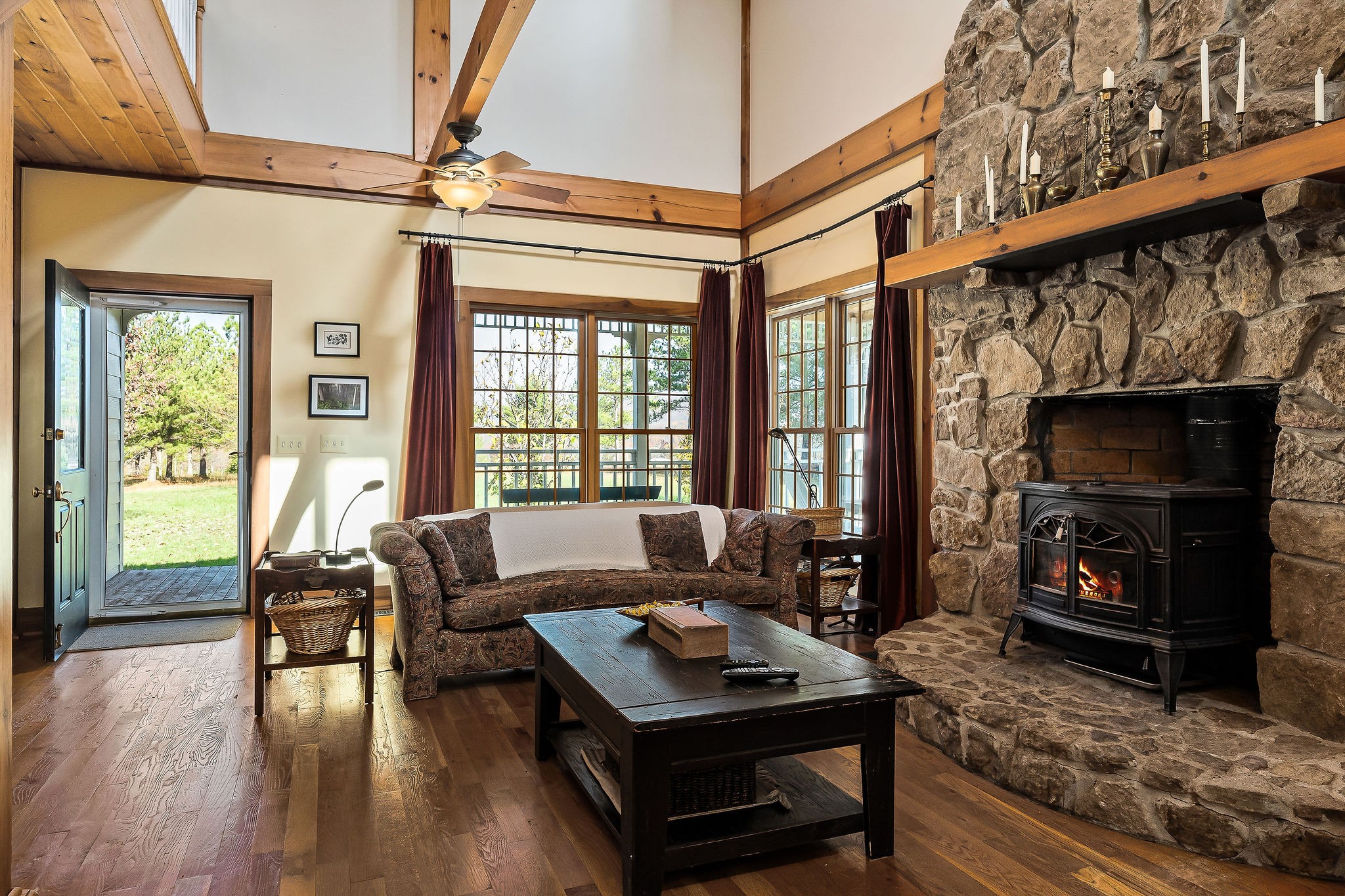 225 Apple Valley Lane Morrison, TN 37357 - Photo 21 of 74 a living room with furniture a flat screen tv and a fireplace