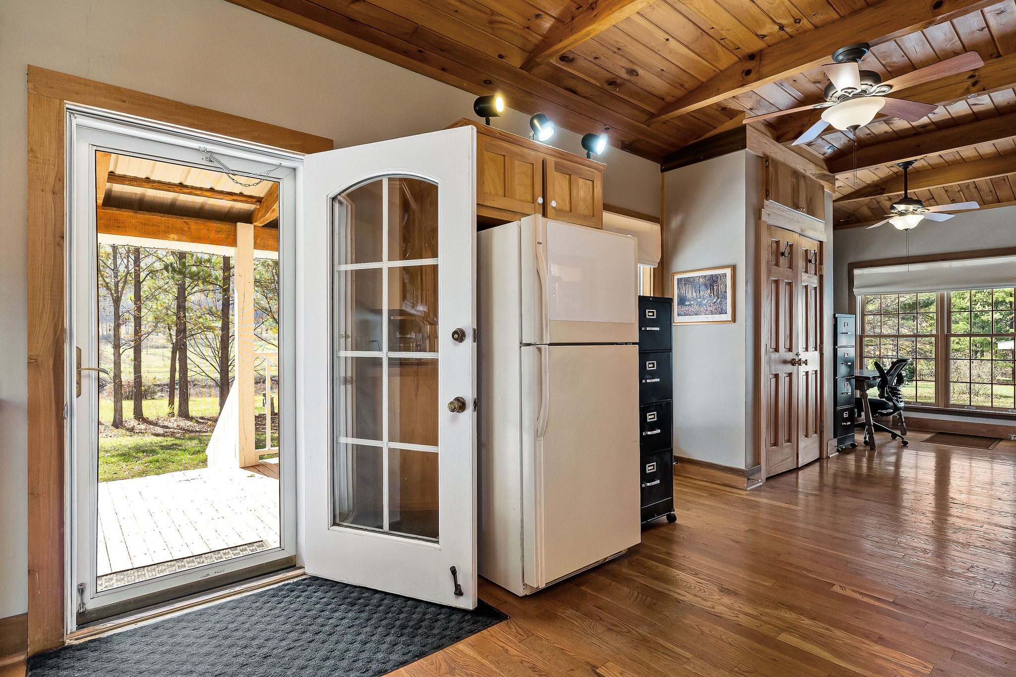 225 Apple Valley Lane Morrison, TN 37357 - Photo 27 of 74 a view of empty room with wooden floor and floor to ceiling window