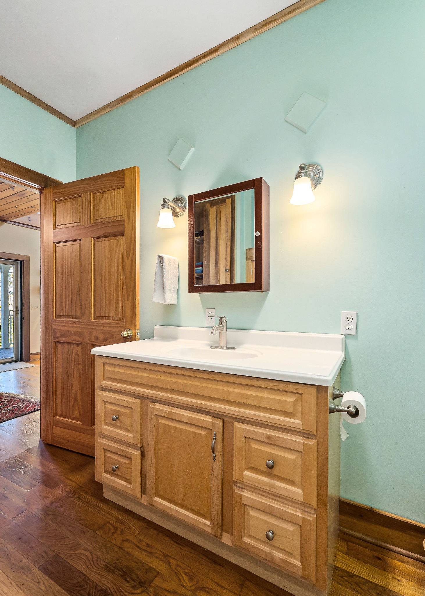 225 Apple Valley Lane Morrison, TN 37357 - Photo 33 of 74 a bathroom with a sink a mirror and a toilet