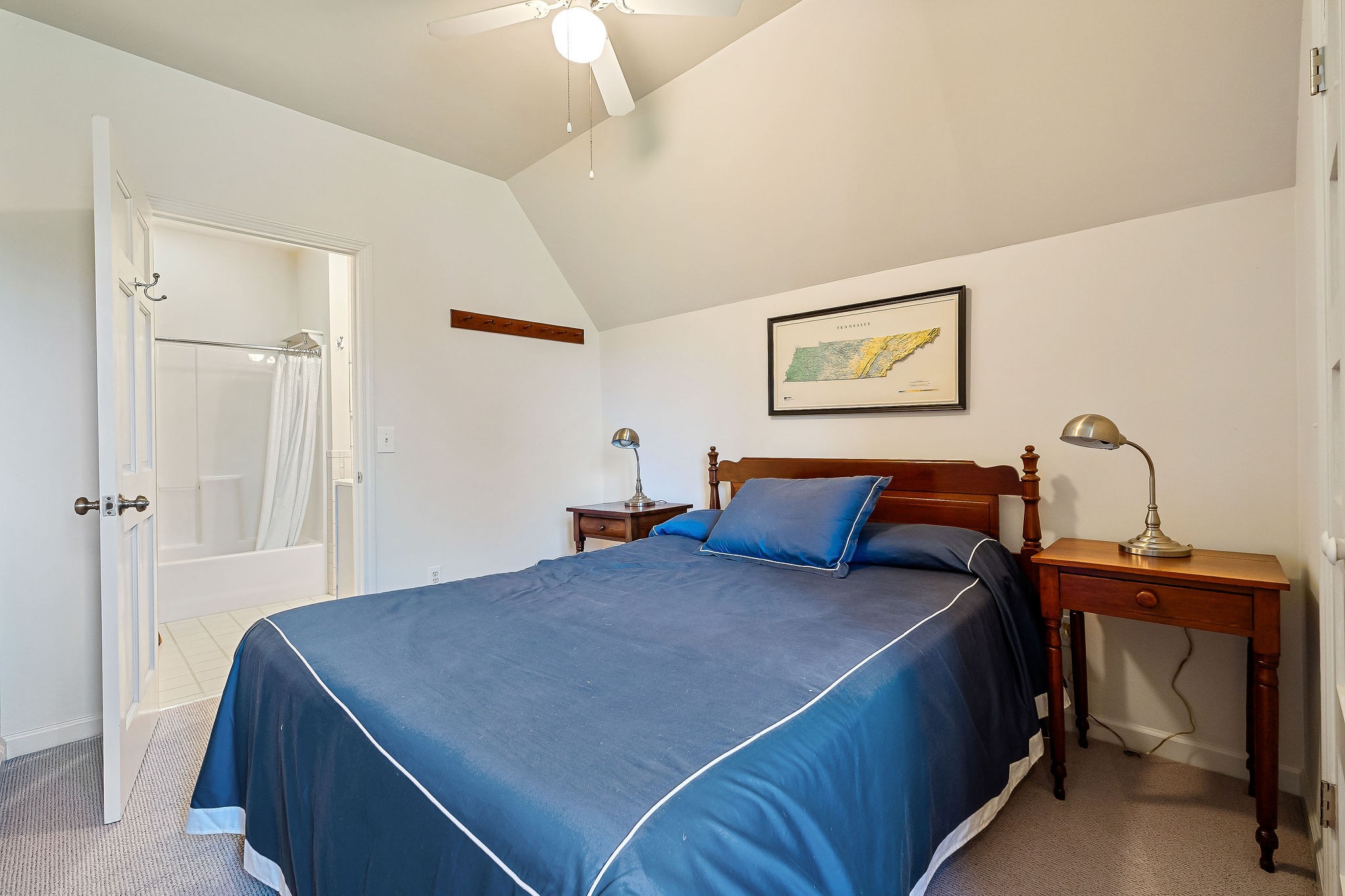 225 Apple Valley Lane Morrison, TN 37357 - Photo 54 of 74 a bedroom with a bed and a table