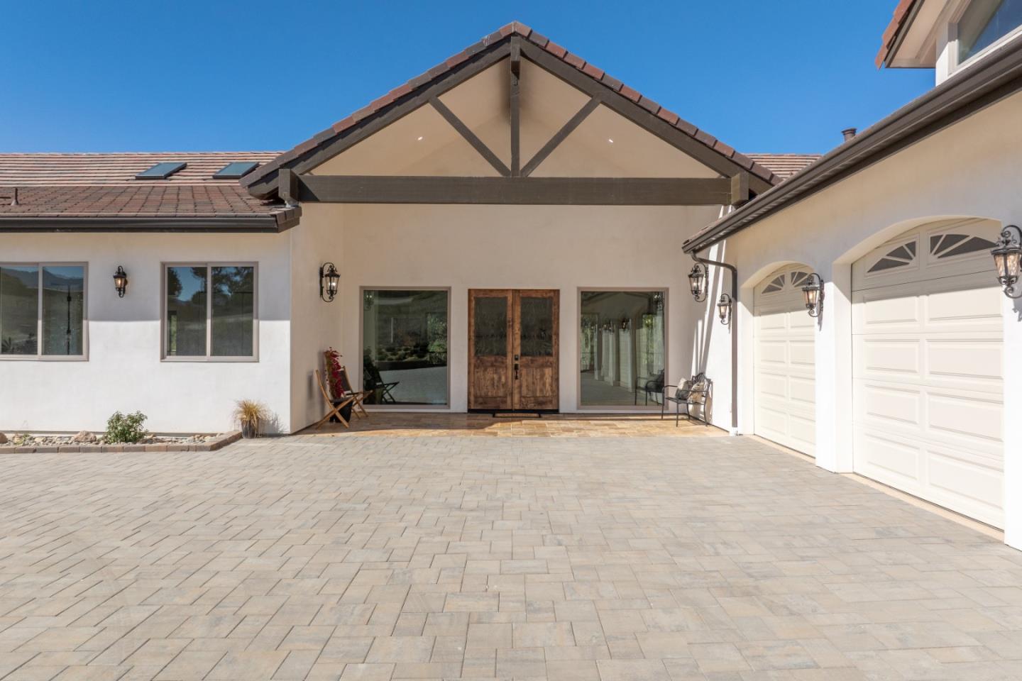 9020 Hidden Canyon Road Salinas, CA 93907 - Photo 13 of 58 a front view of a house with a yard