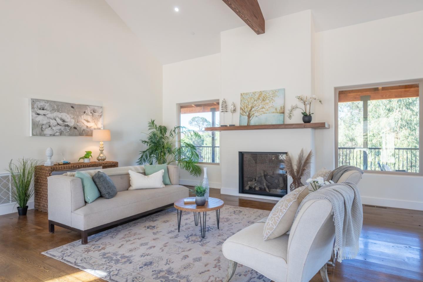 9020 Hidden Canyon Road Salinas, CA 93907 - Photo 16 of 58 a living room with furniture and a fireplace