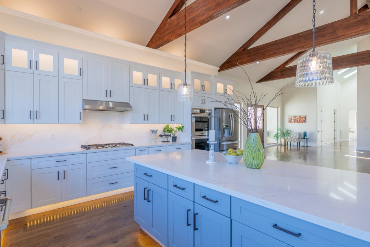 9020 Hidden Canyon Road Salinas, CA 93907 - Photo 21 of 58 a kitchen with stainless steel appliances granite countertop a sink a stove and cabinets